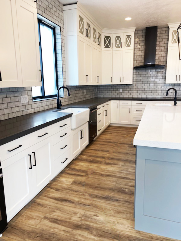 White and gray cabinets with black accessories