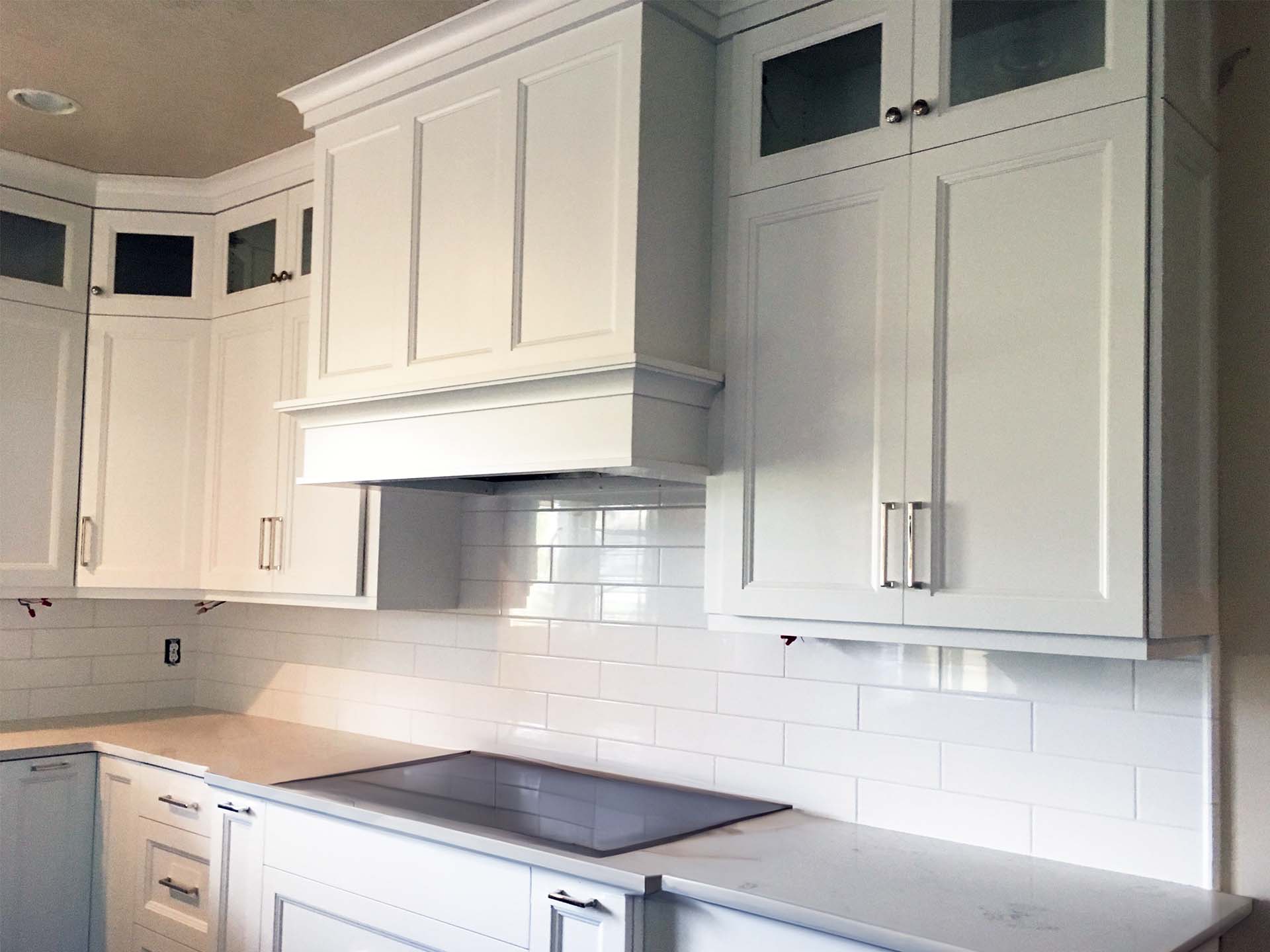White large cabinets installed in a new construction